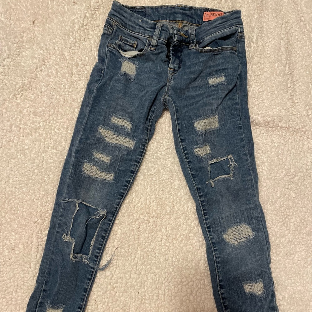 Girls ripped jeans